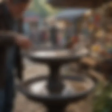 A person inspecting a used bird bath at a local market, showcasing various options available.